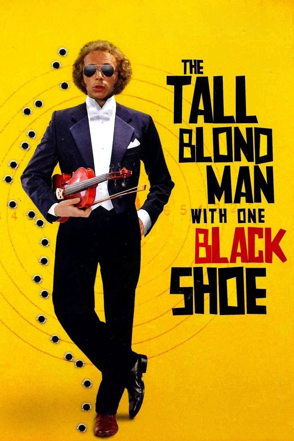 The Tall Blond Man with One Black Shoe photo
